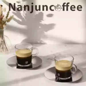 A pair of Nespresso view Espresso cups